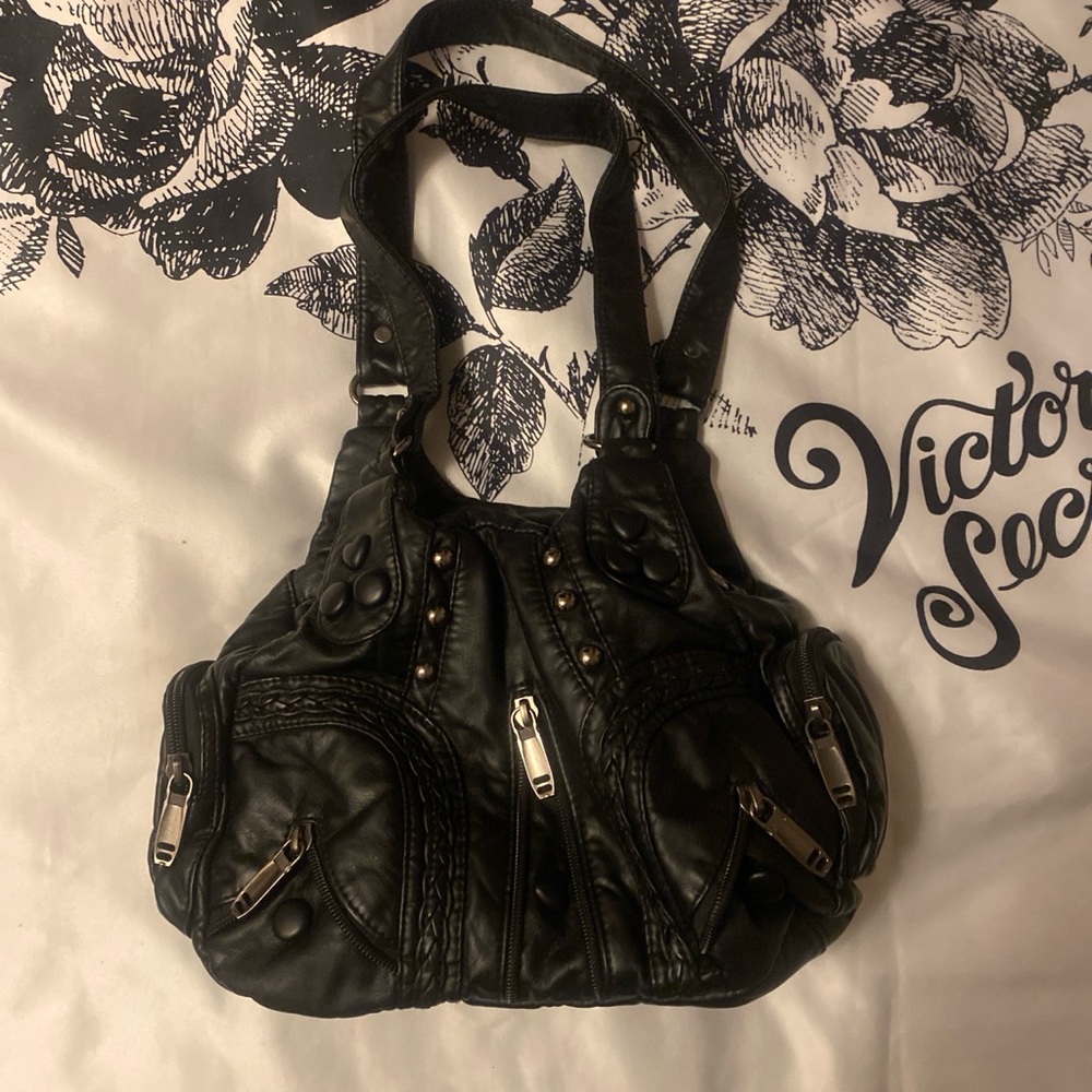 black fake leather shoulder bag with silver zippers